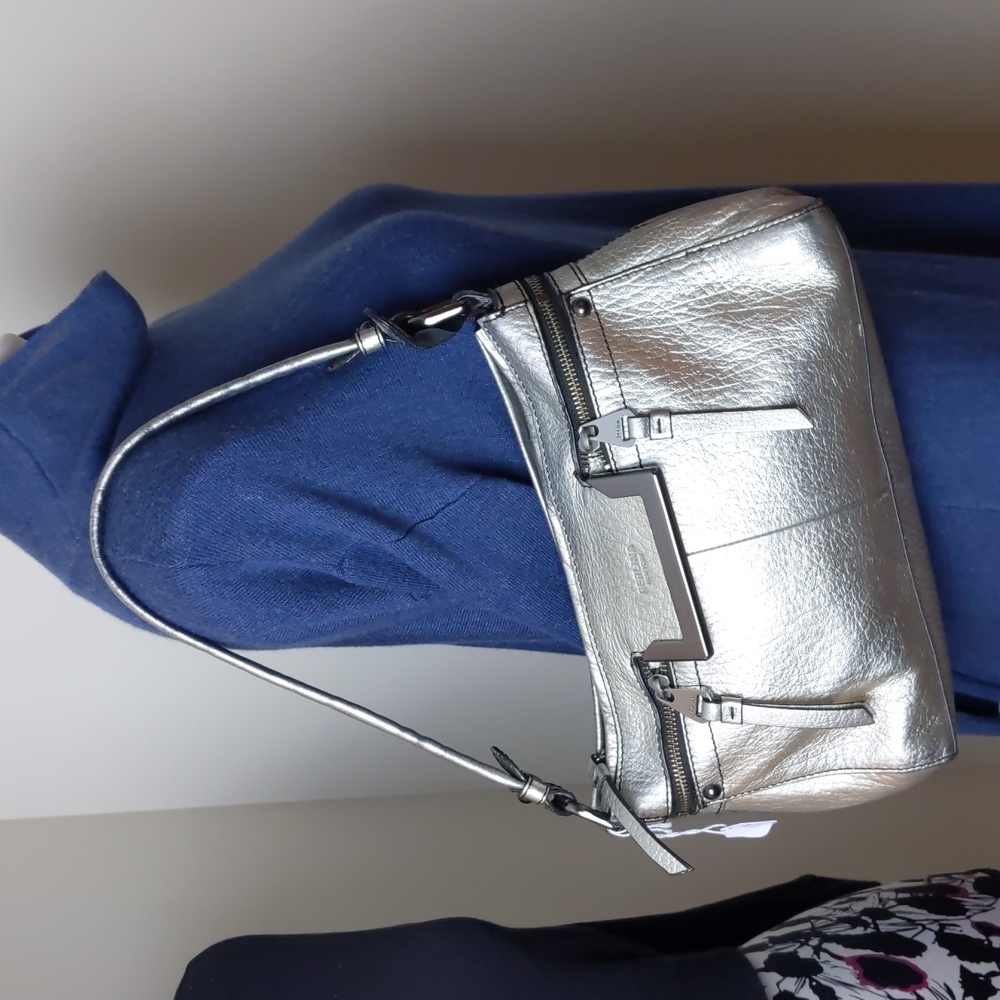 Perlina NY silver metallic pebbled leather handbag  Pockets
